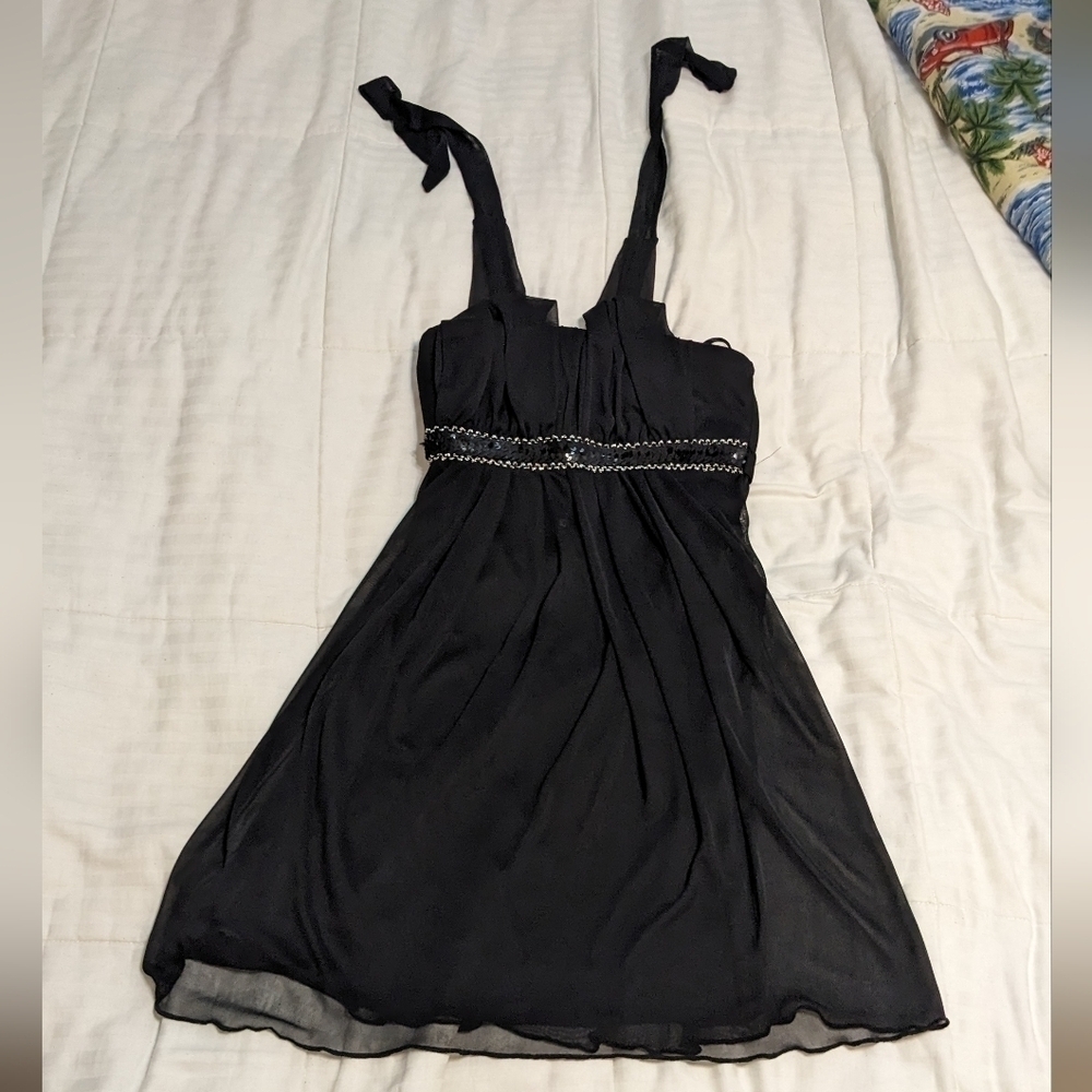 Sweet Storm little black dress with a tie top and sequins size small